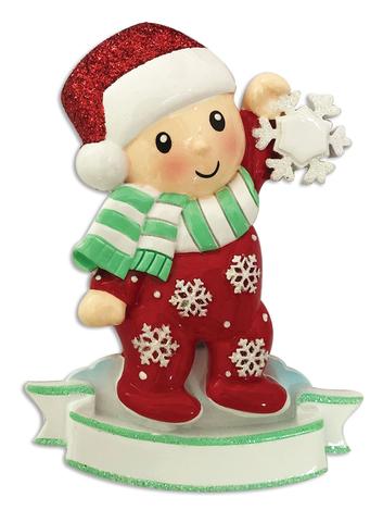 Baby in Pajamas Holding snowflake
