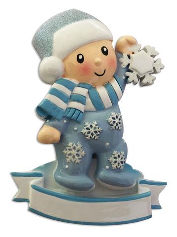 Baby in Pajamas Holding snowflake