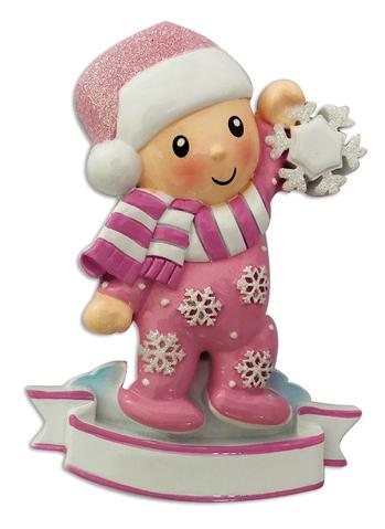 Baby in Pajamas Holding snowflake